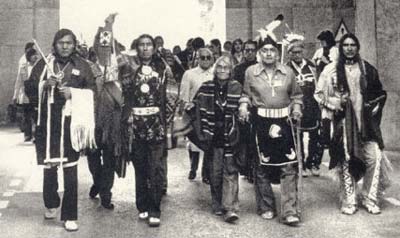 Indigenous delegates, including many of IITC’s founders, enter the Palais de Nations, United Nations in Geneva for the 1st UN Conference on Discrimination Against Indigenous Peoples in the Americas in 1977